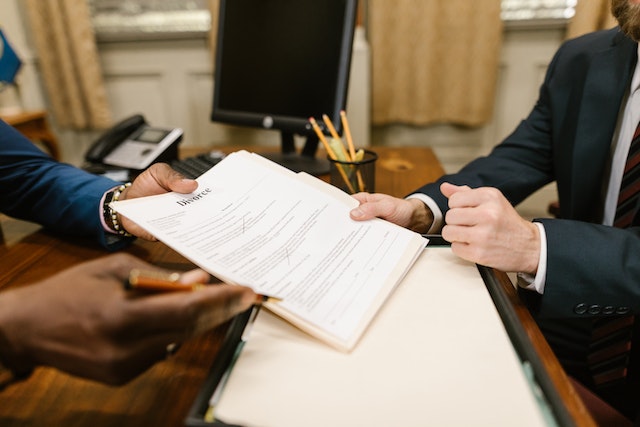 two people looking at document