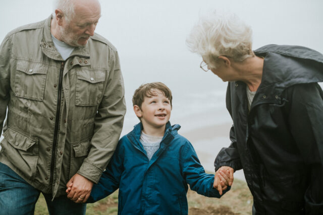 grandparents with grandchild