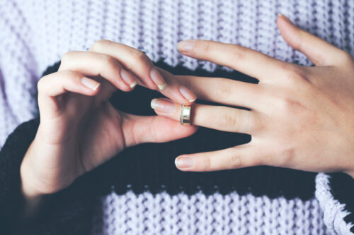 taking wedding ring off finger